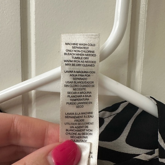 Chico’s black and white vest. Chic animal print with an off-center zipper. - Picture 7 of 8